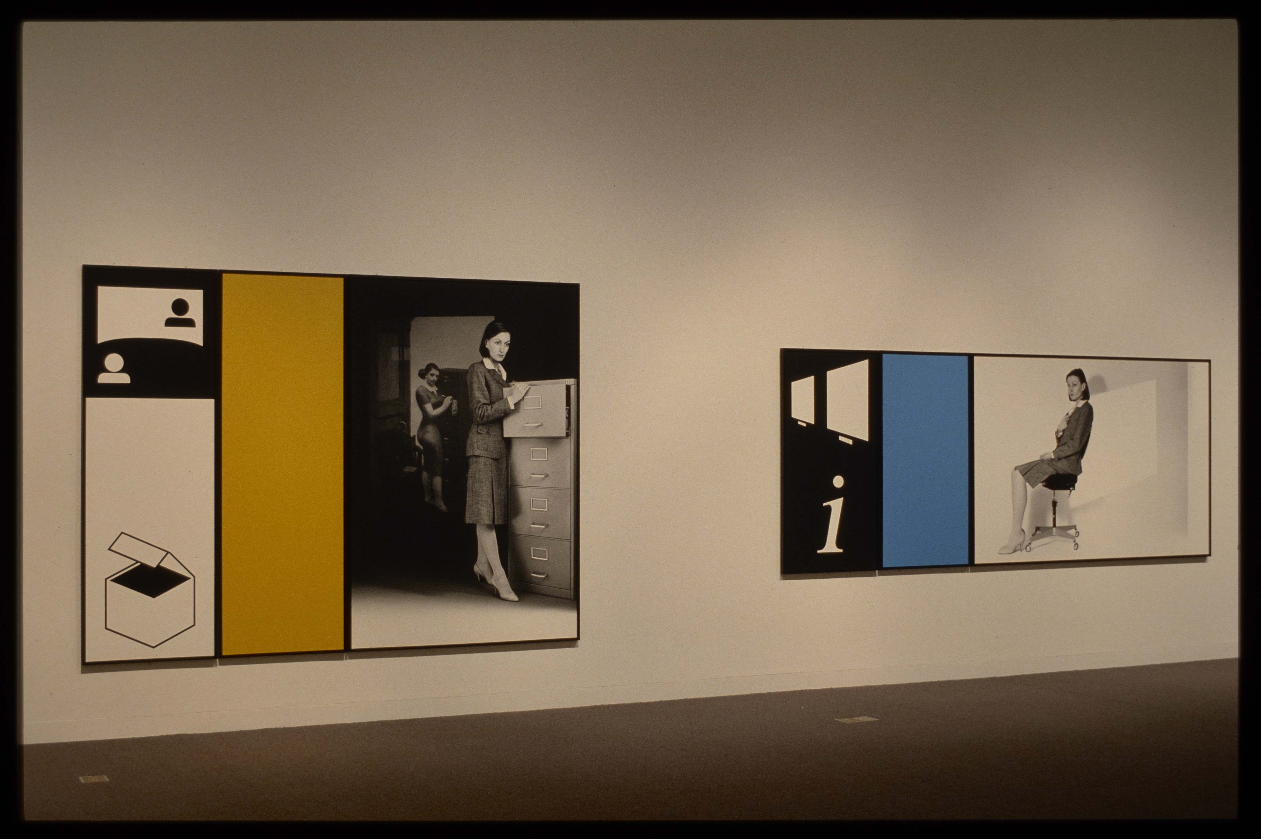 Two artworks are hung next to each other on the wall. Both contain three sections: a figure, a color, and relating symbols.