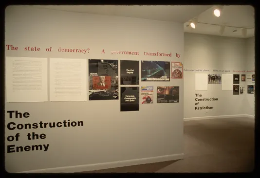 A view of the gallery showing advertisements going around the walls with section headers running beneath them.