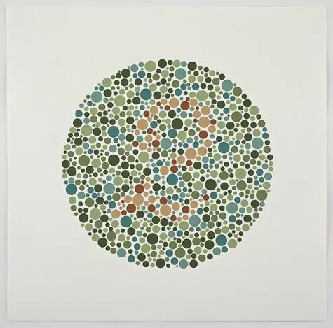 Small dots in various sizes and shades of blue and green create a circle. Hidden within is the number 2, written in orange dots