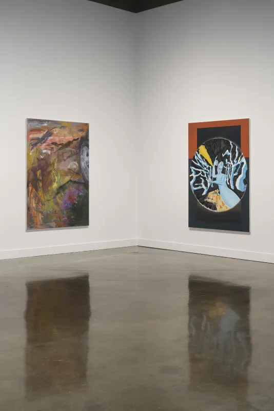 Two paintings by Allison Katz are shown in the corner of a gallery.