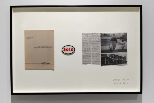 An artwork by Rose Salane features a book clipping that reads "The Peruvian Military", a round Esso sticker, and a newspaper clipping that reads "El Comercio, The Trade"