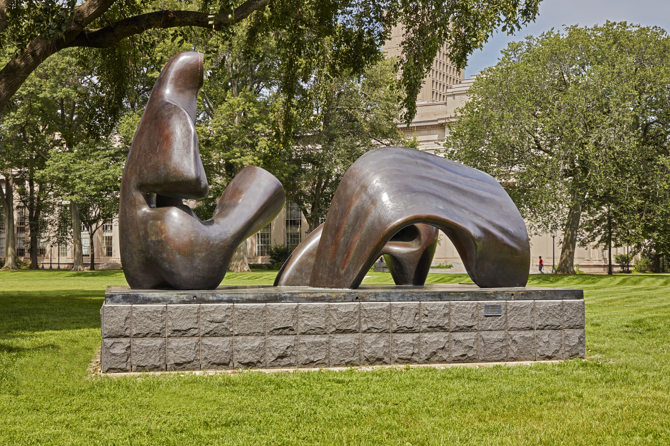 Bronze sculpture of an abstract figure.
