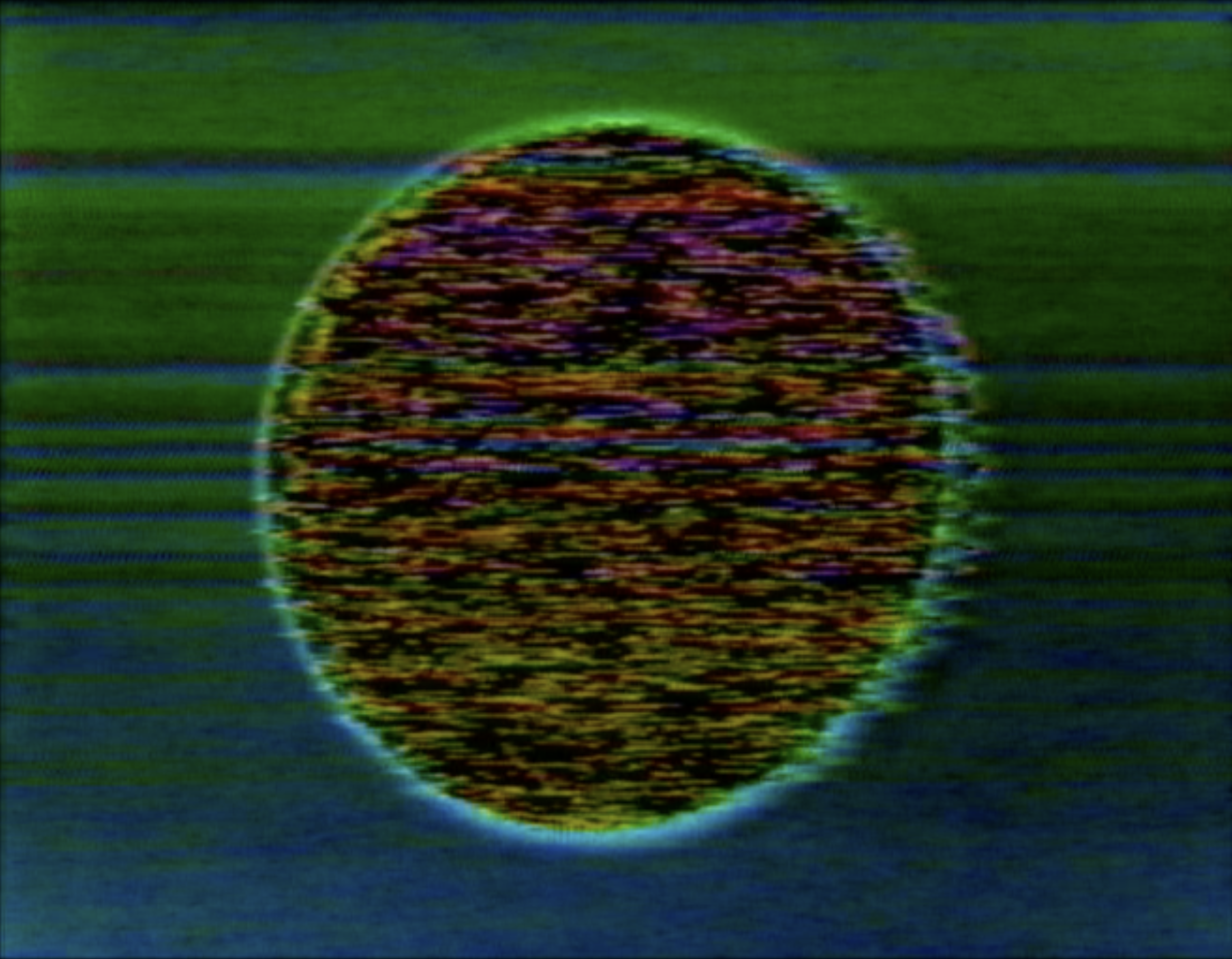 Video still of a dark black and red hued sphere in the center of the screen surrounded by green horizontal lines.