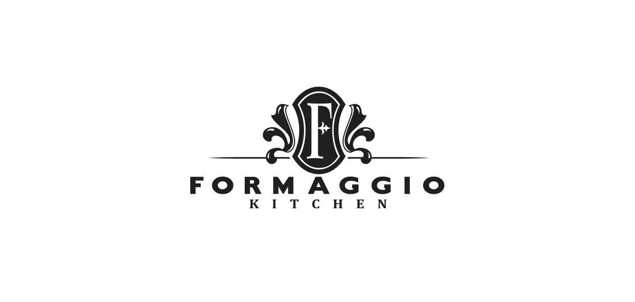Logo for Formaggio Kitchen. Text reads "FORMAGGIO KITCHEN"