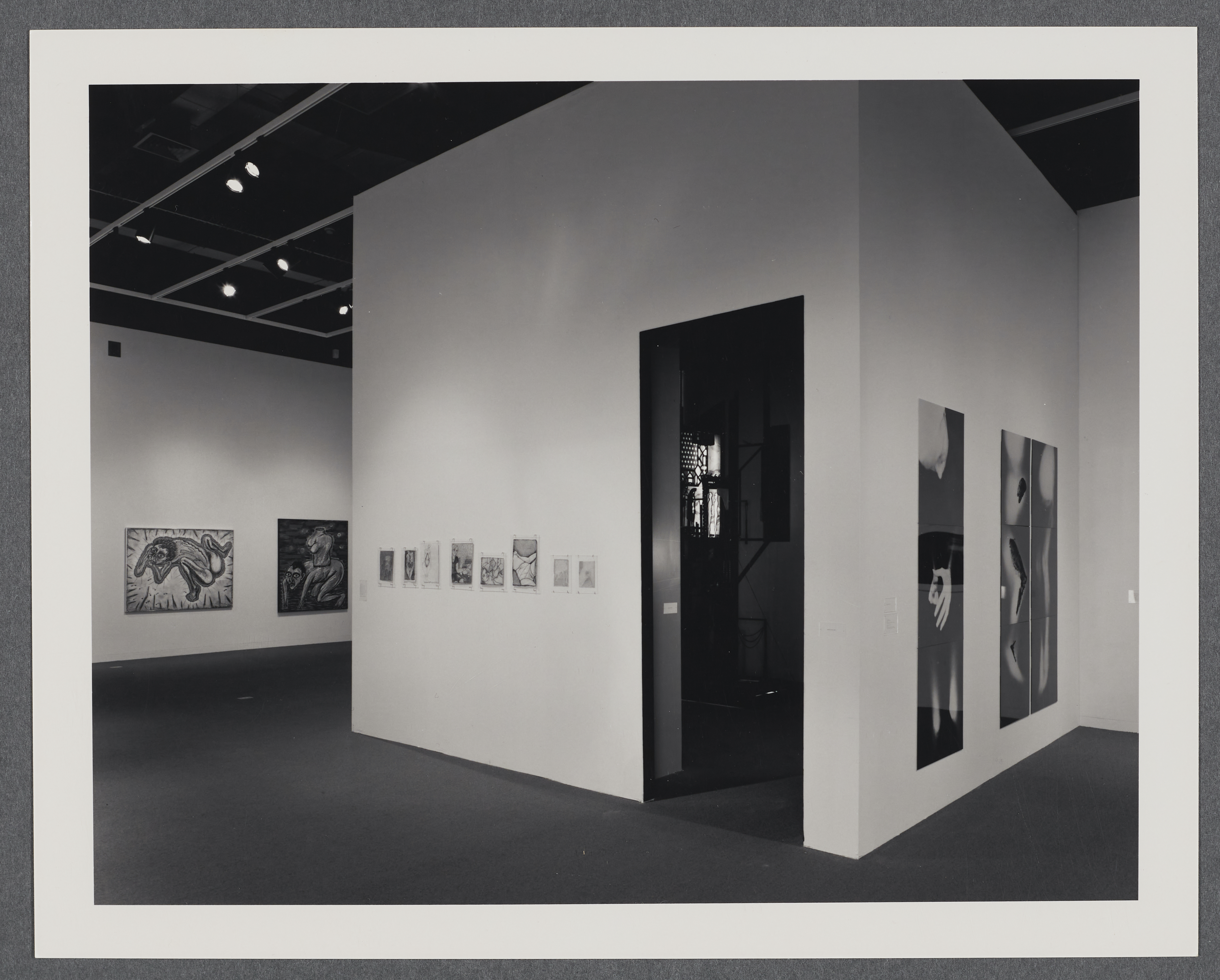 A smaller room within the gallery holds an installation while 2 dimensional works hang on the gallery walls. 