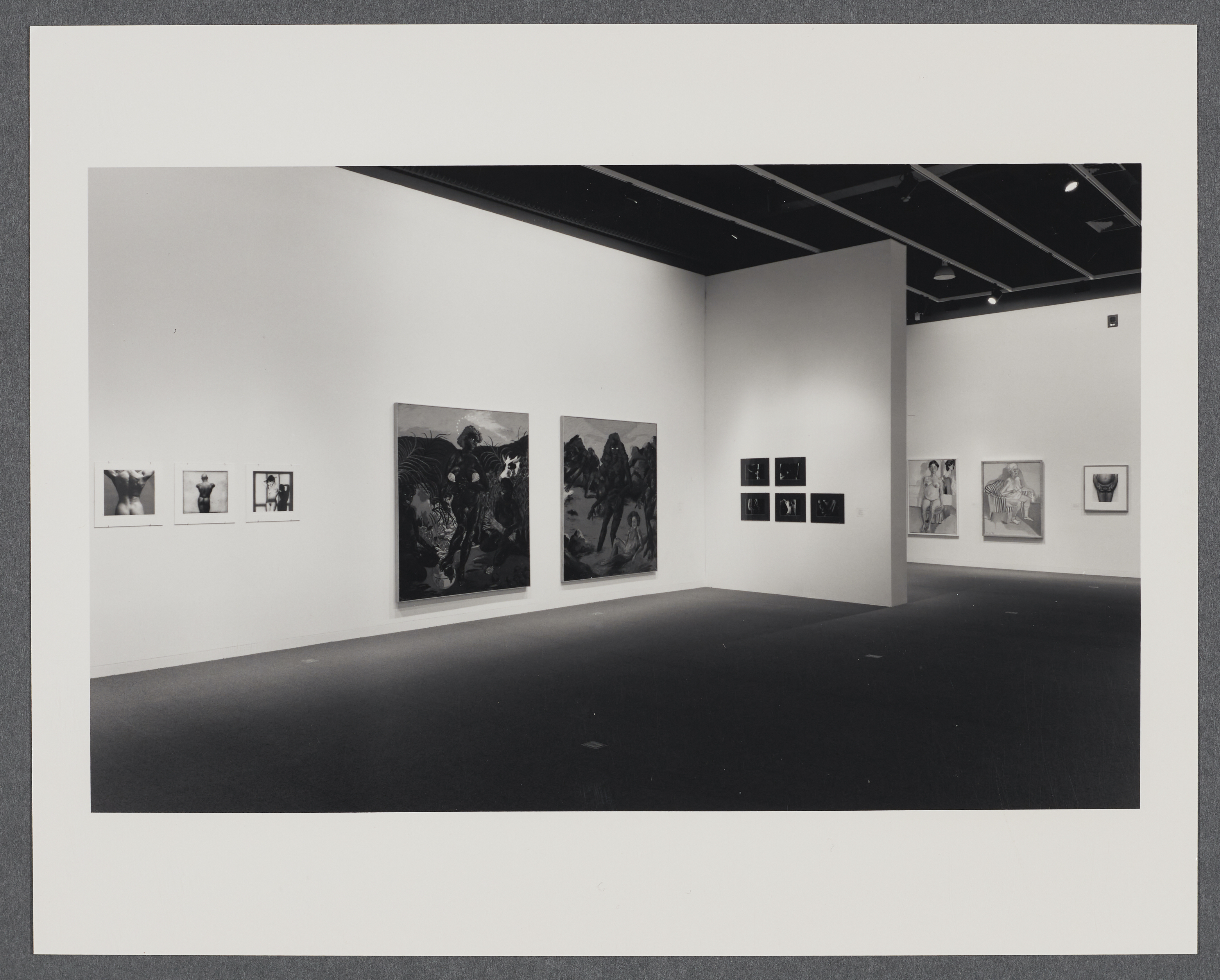 2 dimensional artworks of different dimensions and media explore the subject of the nude human figure.