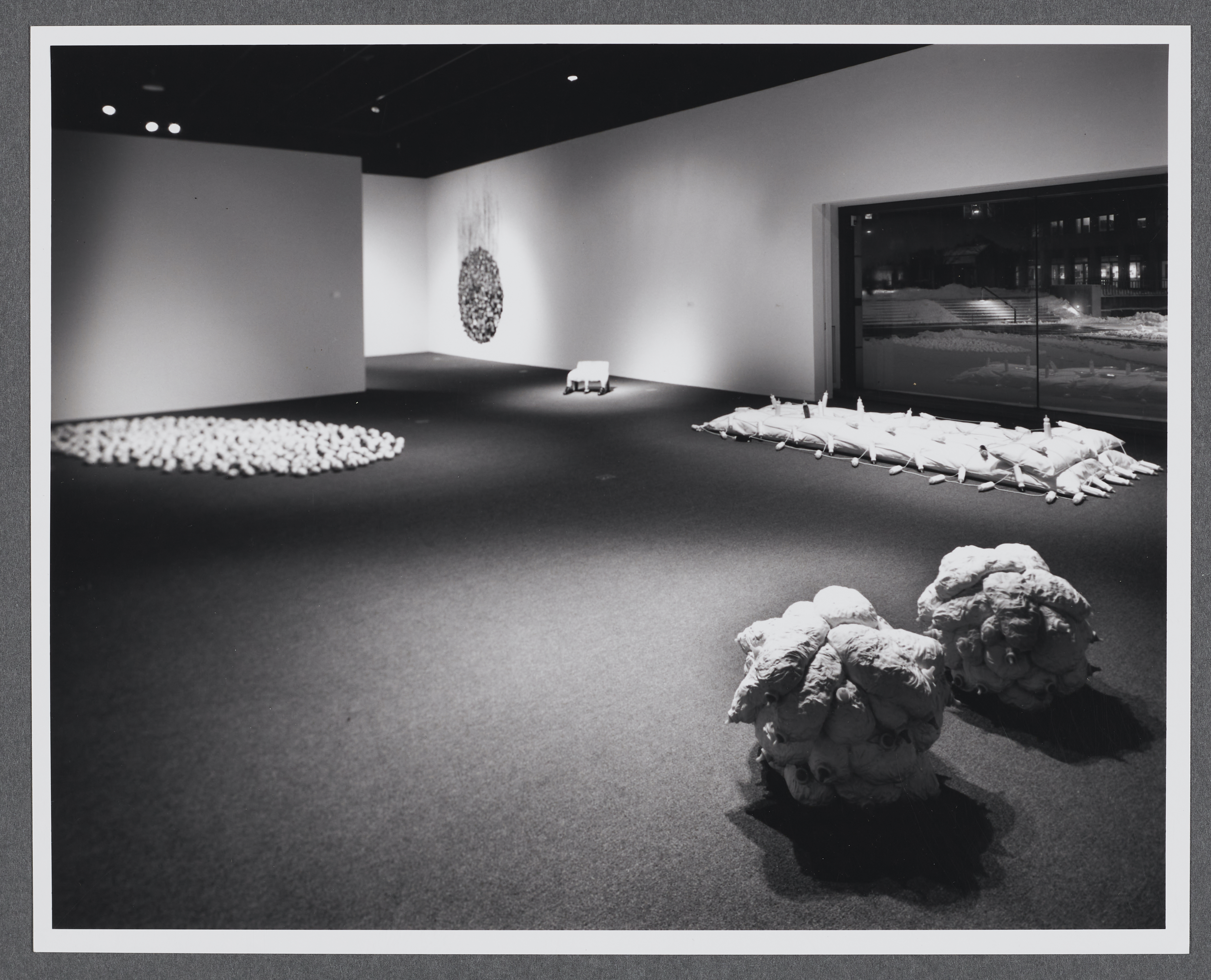 Sculptures are configured in separate installations on the gallery floor. All of the sculptures are organically shaped.