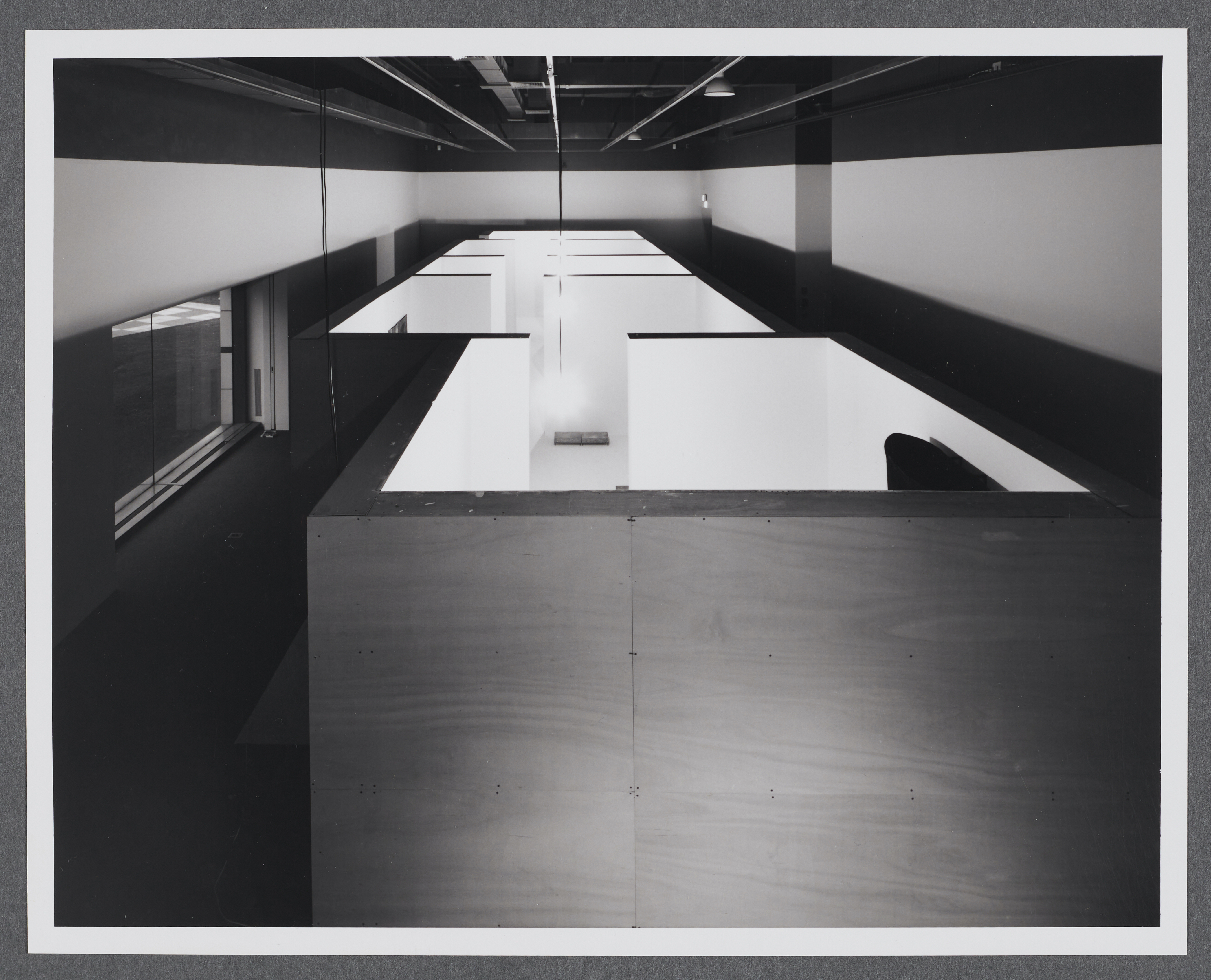 A birds eye view of the gallery that shows the recreation of the artist’s multi-chambered workspace.