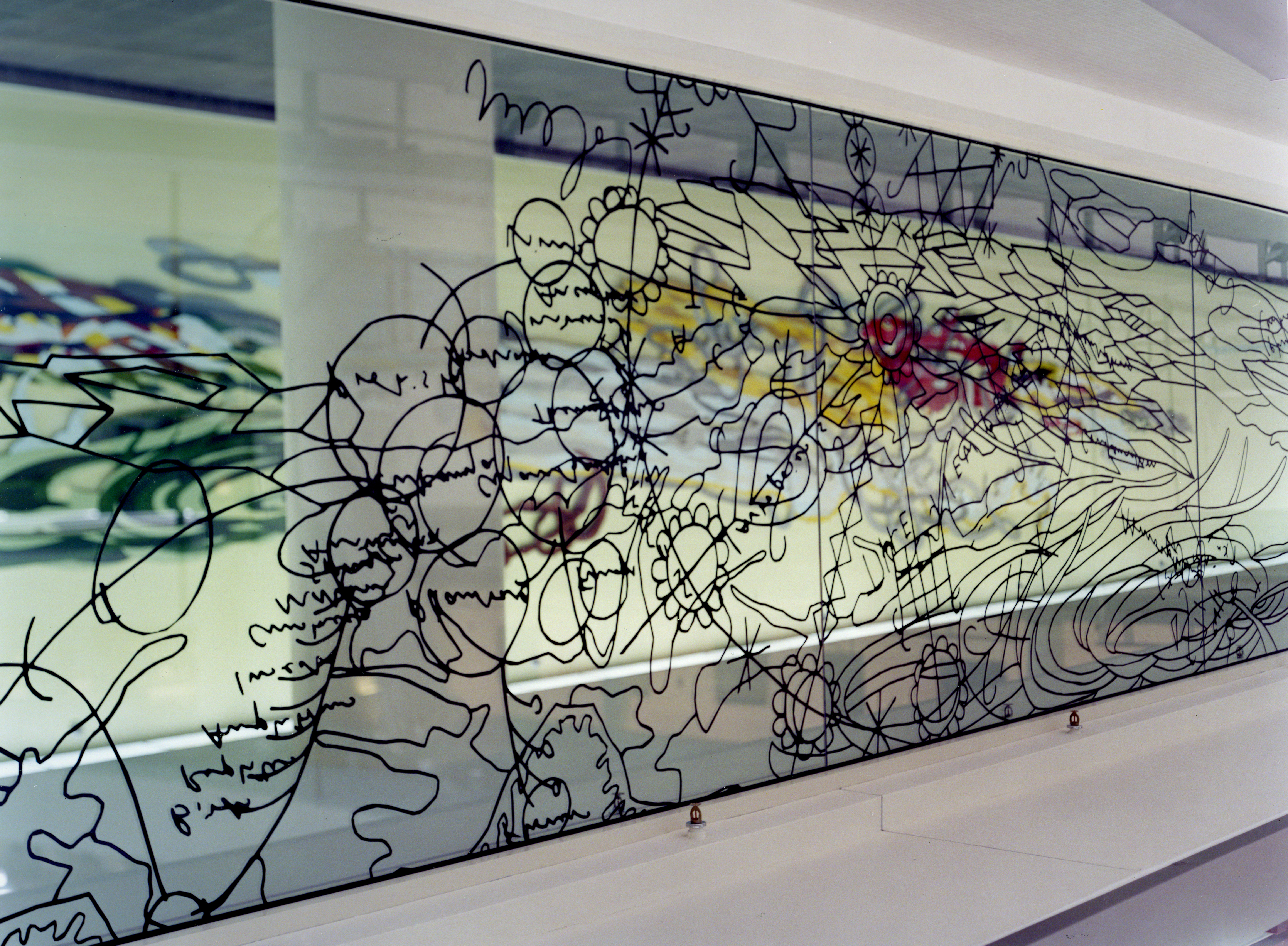 Matthew Ritchie's Games of Chance is displayed on glass.