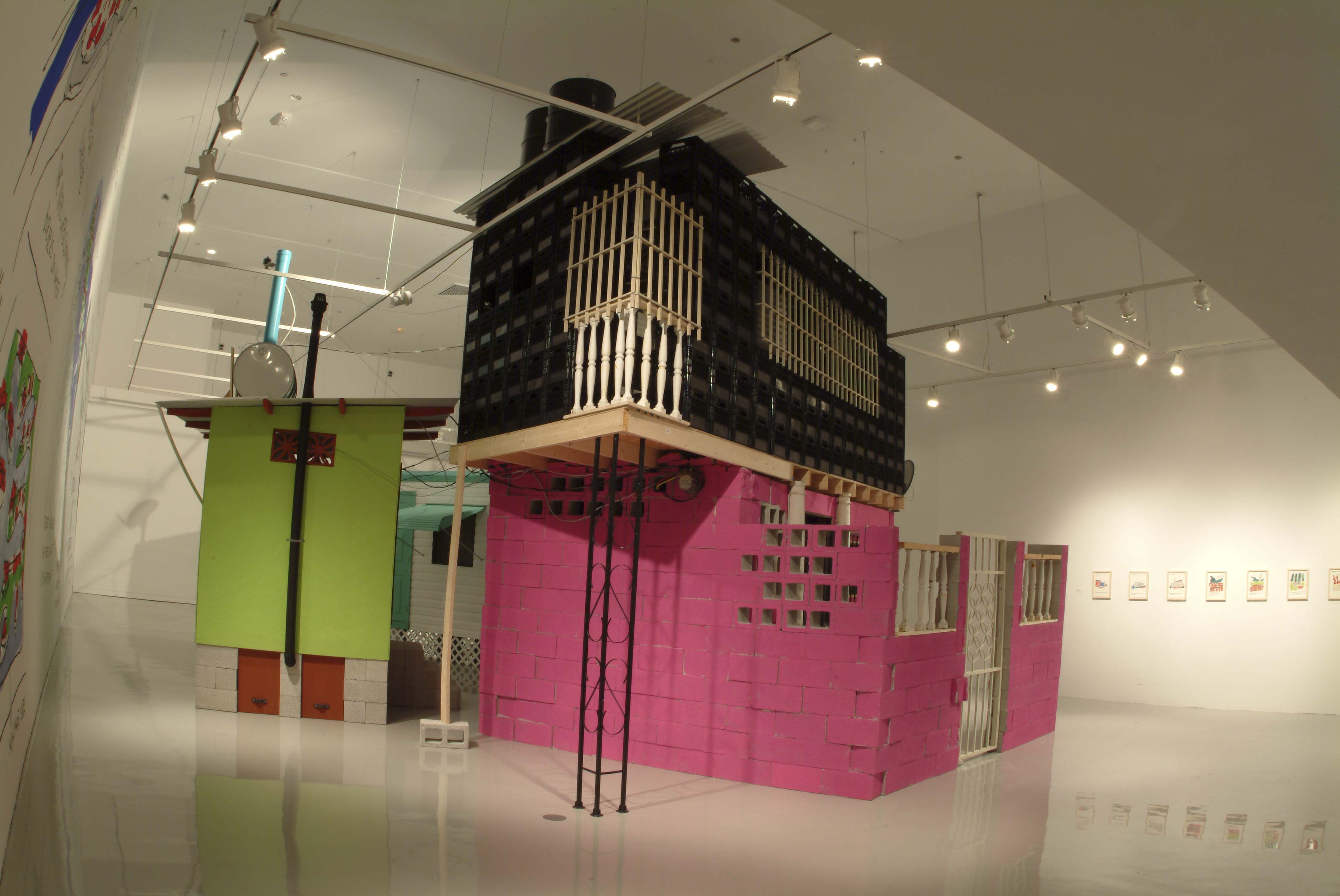 A house with fenced windows constructed from various materials, painted pink at the base level and black on the 2nd