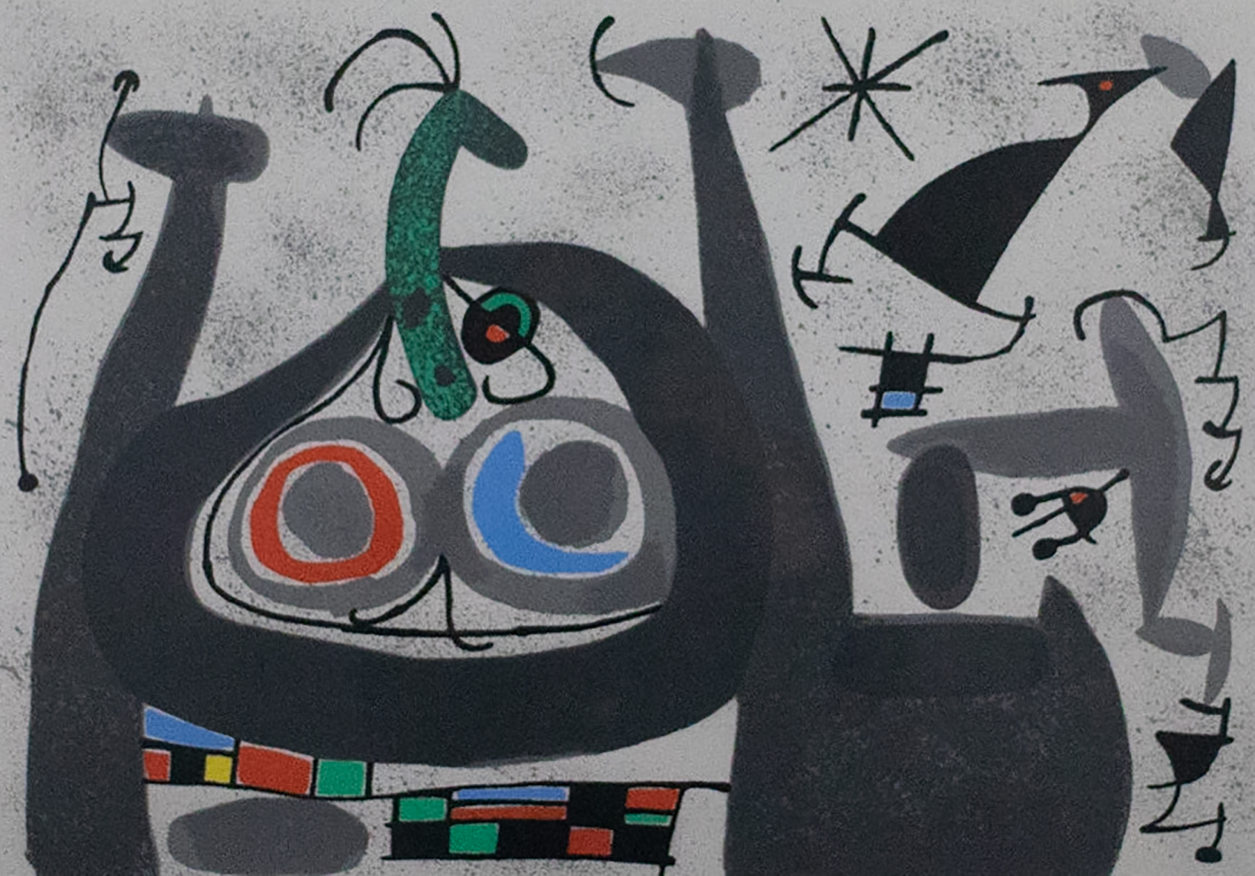 Gray background with gray and black shapes resembling small figures.