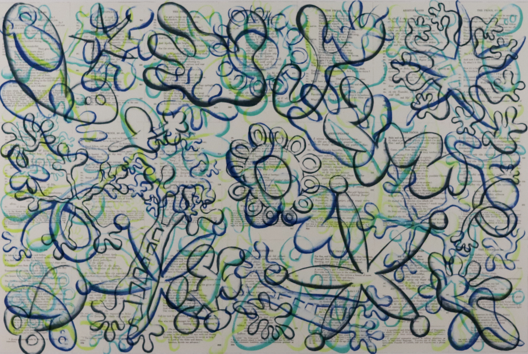 Green and blue swirl shaped squiggles on a piece of paper that resemble frogs and flower petals.