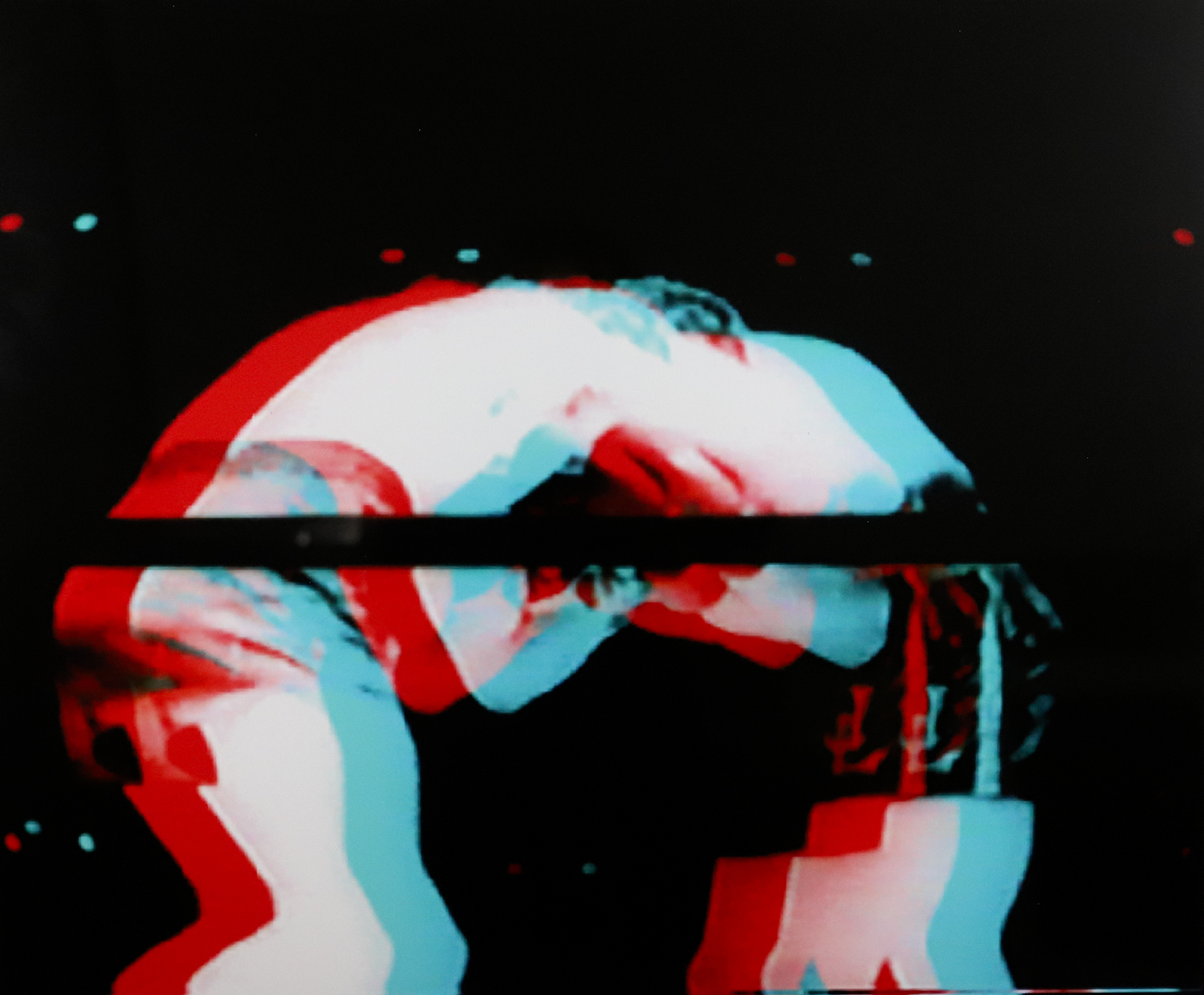 Distorted photograph of two men in a boxing ring with a red and blue overlay that resembles the view with 3d glasses on.