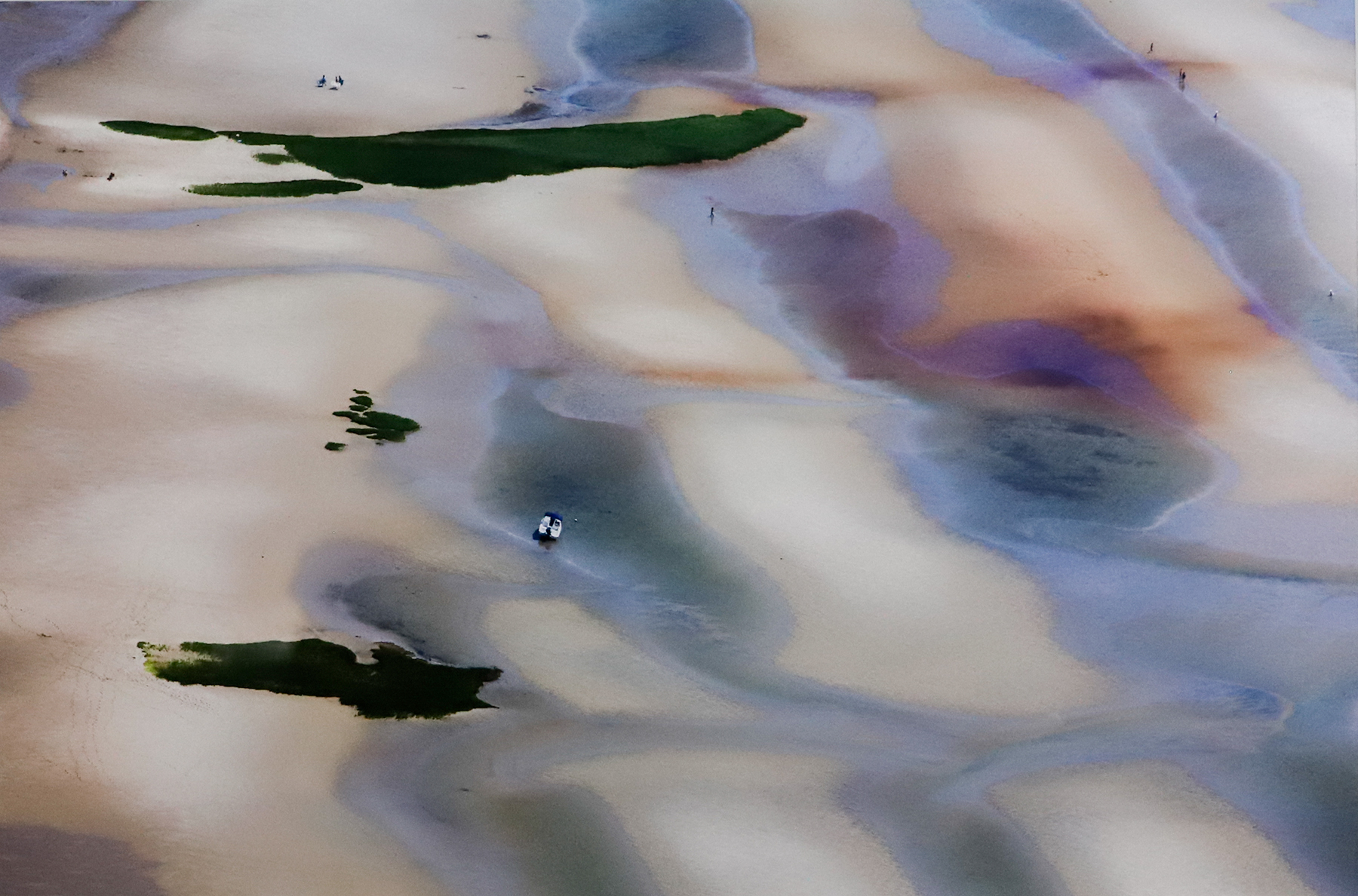 Warped colors resembling water moving featuring light peach, purple, and dark green.