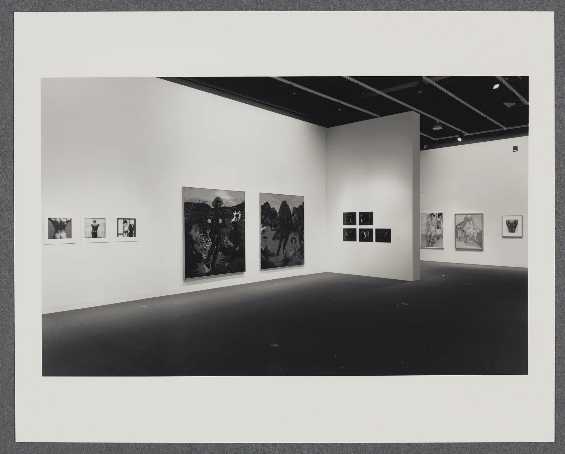 2 dimensional artworks of different dimensions and media explore the subject of the nude human figure.