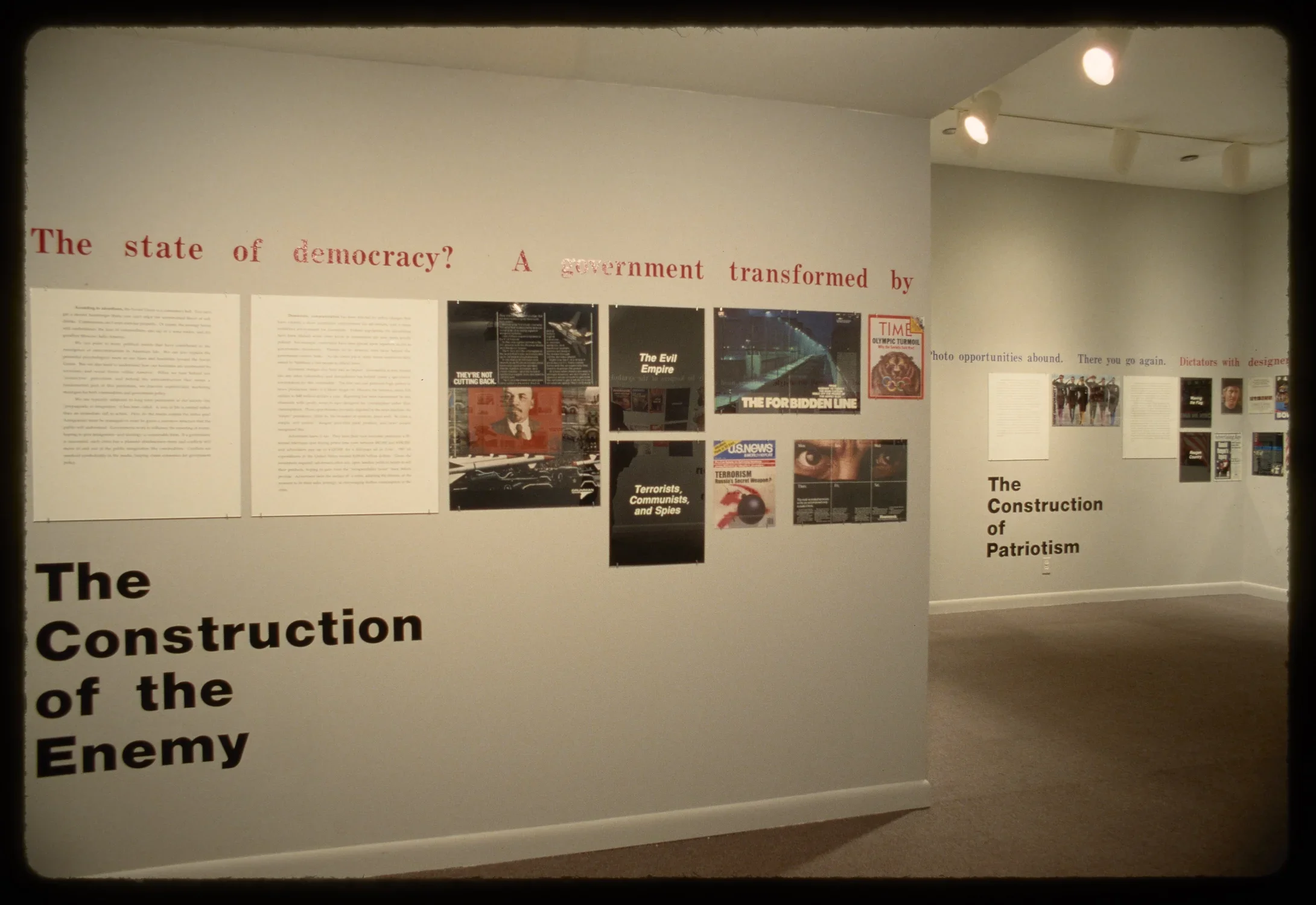 A view of the gallery showing advertisements going around the walls with section headers running beneath them.