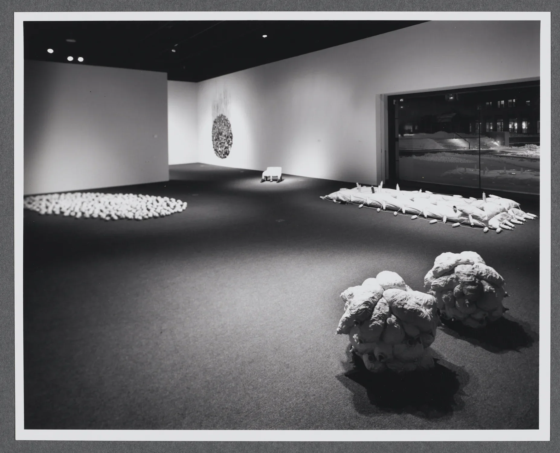 Sculptures are configured in separate installations on the gallery floor. All of the sculptures are organically shaped.  