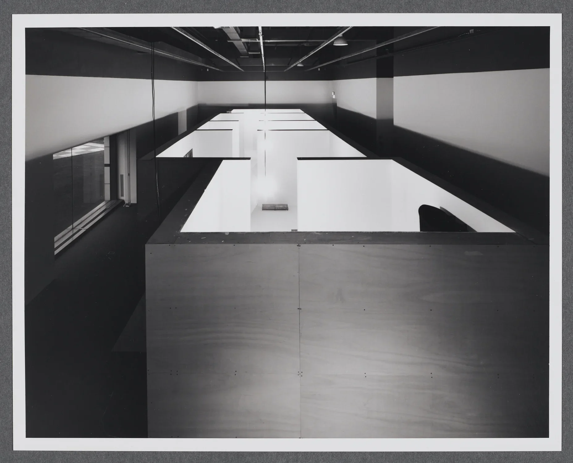 A birds eye view of the gallery that shows the recreation of the artist’s multi-chambered workspace.