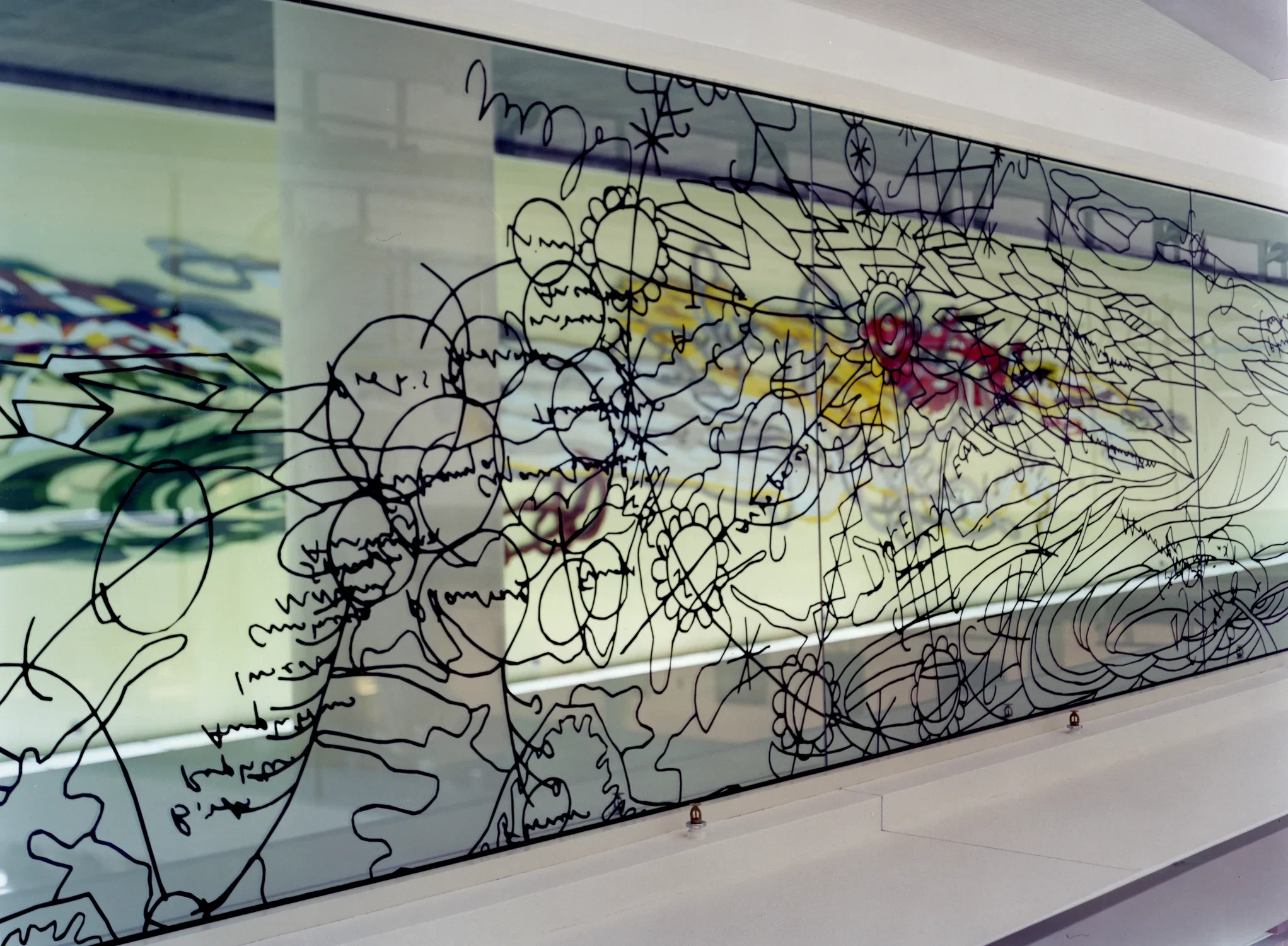 Matthew Ritchie's Games of Chance is displayed on glass.