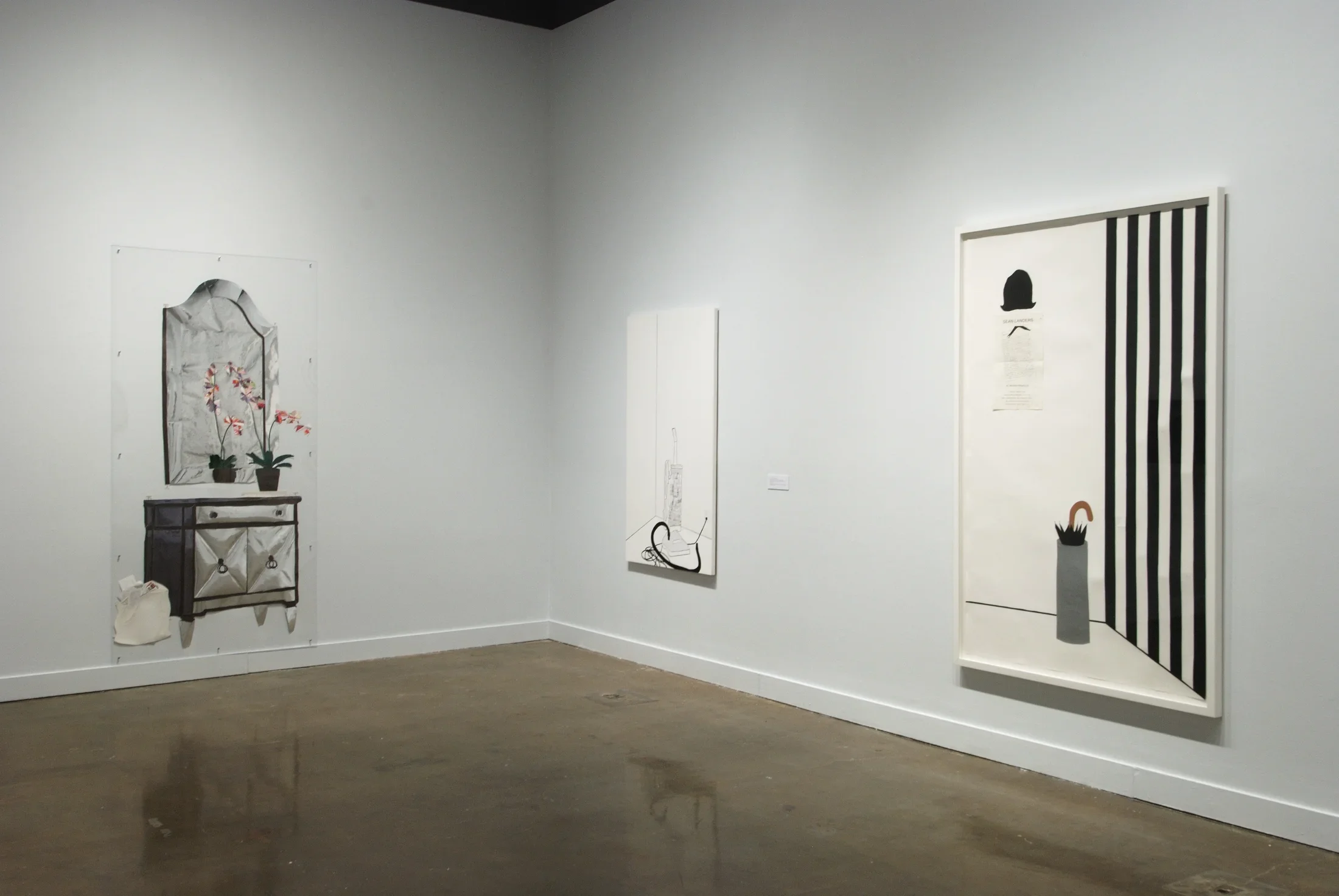 Three works by Frances Stark all hang on two walls. All depict interior scene illustrations such as an armoir, an umbrella holder, and a vaccuum. 