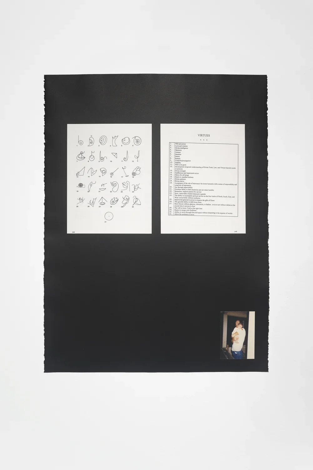 A page of black-and-white squiggly-line drawings and a list of “Virtues” above a color photo of dad and baby on black paper