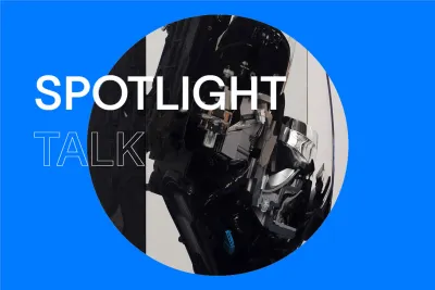 Blue background with a closeup of a resin encapsulated sculpture in a circle in the center with title on the left that reads &quot;Spotlight Talk&quot;