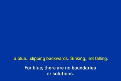 Blue screen with yellow and white text that reads &quot;a blue...slipping backwards. Sinking, not falling. For blue, there are no boundaries or solutions.&quot;