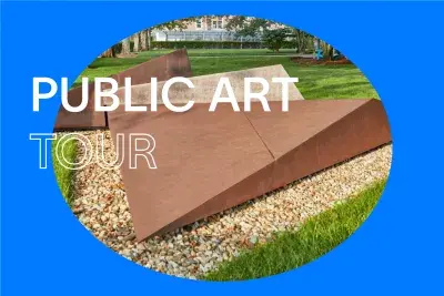 Bright blue background with white text that reads &quot;Public Art Tour.&quot; In the center, there is an oval image of Corten steel sculpture surrounded by pebbles on a lush green grass.