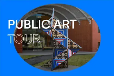 Bright blue background with white text that reads &quot;Public Art Tour.&quot; In the center, there is an oval image of large colorful geometric patterned sculpture in the grassy lawn in front of a brick building.