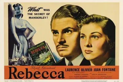 A man and a woman are seen looking off into the distance, to the right side of a statue on the left of the frame. The text reads "Rebecca. What was the secret of Manderley?""