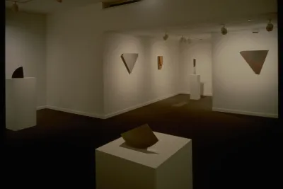 Form studies are both hanging on the walls and displayed on pedestals. Each study has its own unique shape and form.