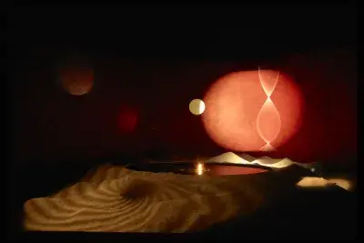 Installation with red circular lights above a reflecting pool within a ridged landscape with whirlpool shadow.