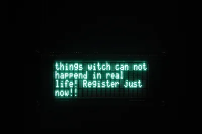 Green graphic text reads “things witch can not happend in real life! Register just now!!” on black background