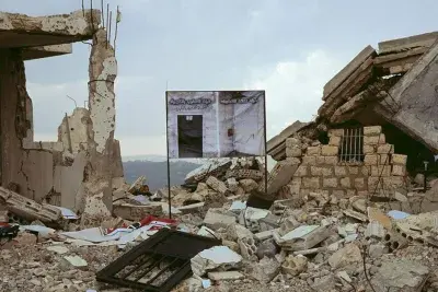 A woman in a white shirt looks at the camera and a subtitle reads "My name is Soha".