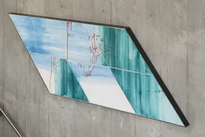 A green and blue painted ceramic parallelogram by Nick Mauss.