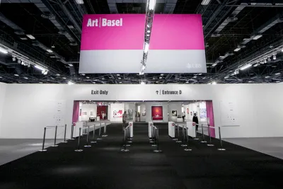 A pink banner reads "Art Basel" and under is an entrance and exit.