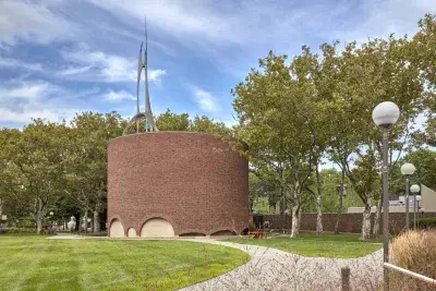 A photo of Eero Saarinen's MIT Chapel from the front entrance in the daytime.