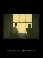 Black book cover for Angela Grauerholz: Recent Photographs featuring a sepia-toned photograph of two people looking out a window.