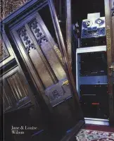 Book cover for Jane and Louise Wilson featuring a video still of a brown door reflected in a mirror.