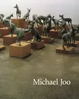 Book cover for Michael Joo featuring an image of Joo's animal sculptures lined up next to one another.
