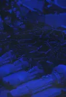 Book cover for 9 Evenings Reconsidered: Art, Theatre, and Engineering, 1966 a blue hued photograph of flashlights and wires.