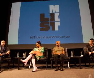 2018 Wasserman Forum panelists are seated on stage with the MIT List logo behind.