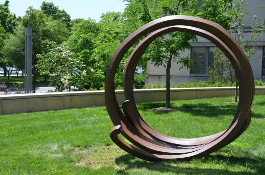Rolled steel sculpture  in which two coils of rolled steel, measuring more than seven feet high, overlap like jumbled, oversized springs