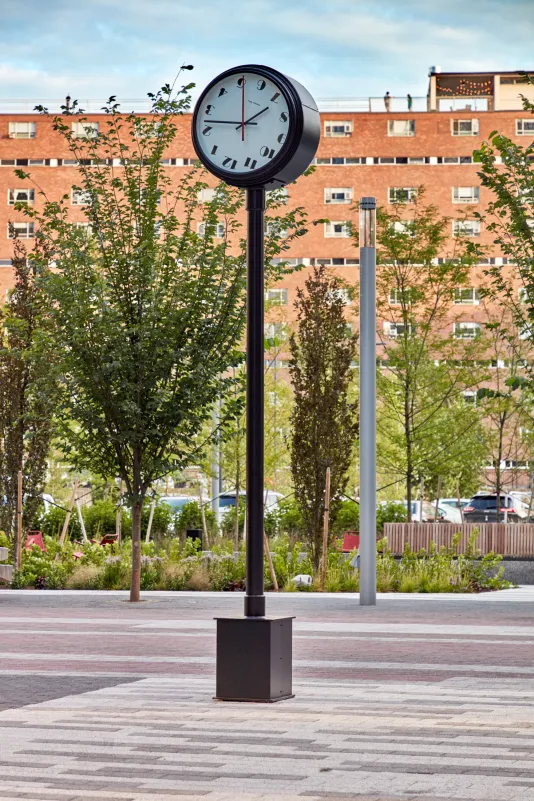  A freestanding clock with a restrained modern design