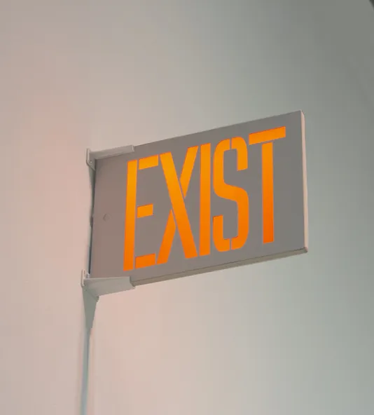 Red exist sign that reads EXIST