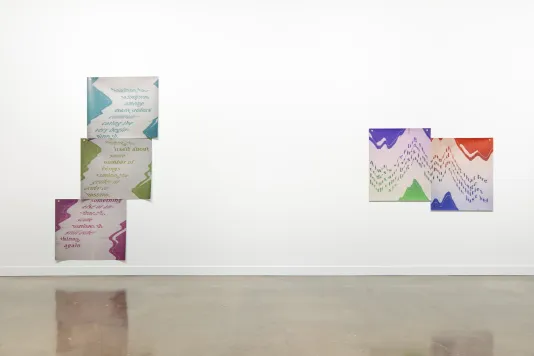 Installation view featuring three inkjet prints on vinyl staggered on top of each other on the left and two prints staggered side by side on the right.