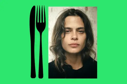 A bright green background with a black graphic of a fork and knife on the left and a headshot of a woman with brown hair wearing a black top.