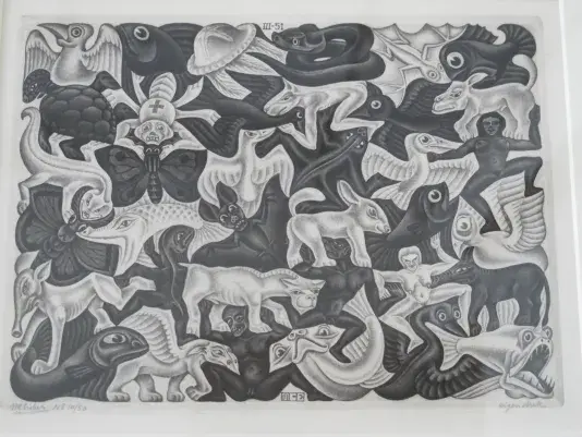 Black and white wood engraving print featuring various animals and human figures all connected like a puzzle.