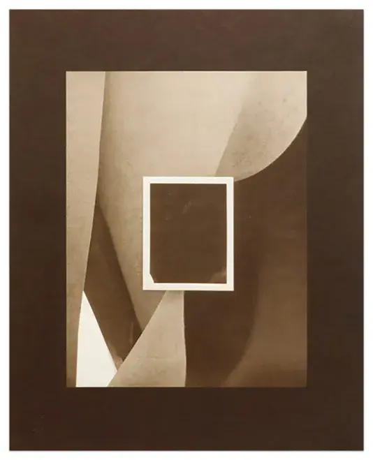 Image of a black and white photography collage with a wide black border and white frame. The central image is a sepia colored geometric pattern with a black rectangle and a white border in the center of the frame.