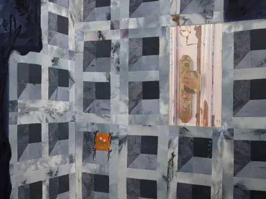 A close-up detail of a blue painting featuring a cinder block-like pattern. Within the pattern is a section showing a doorknob with a reflection of a cell phone. To the left, a small brown square contains a pink floral motif.